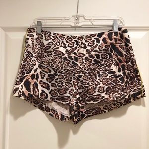Silky leopard shorts with neon green seams